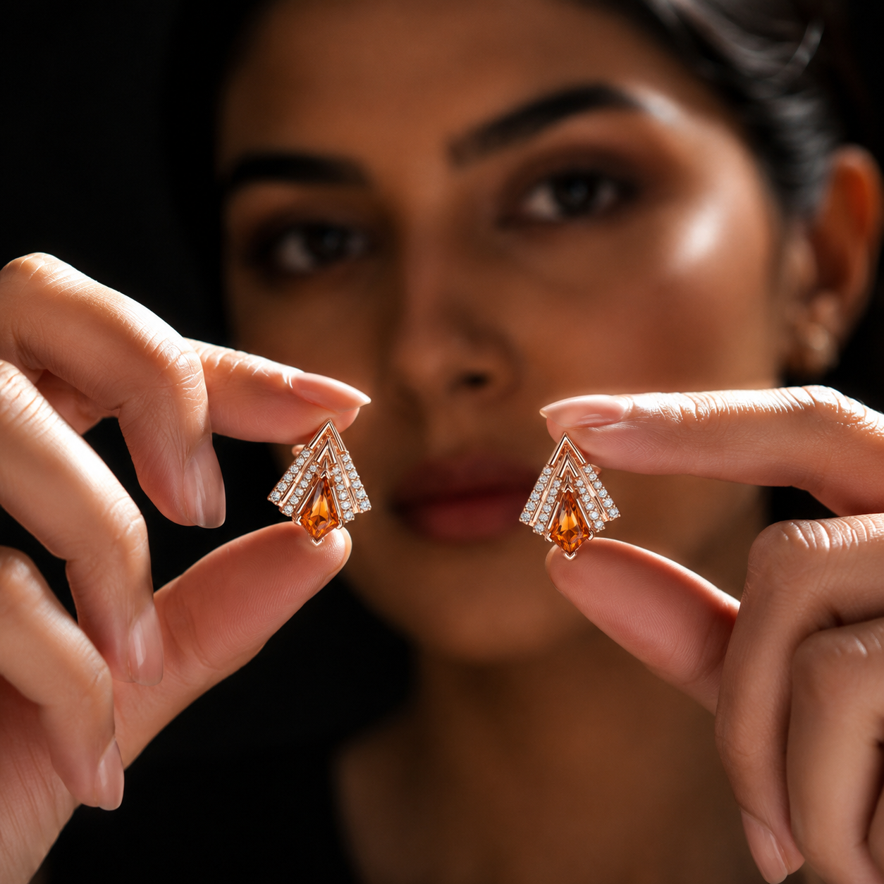 Modern V-Curve Trillion Orange Stone Diamond Earrings